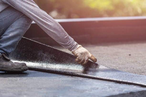 Professional Waterproofing technician working in Leesburg, VA